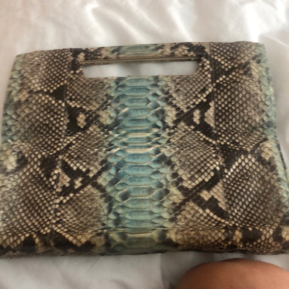 Used but gets better and better snake skin